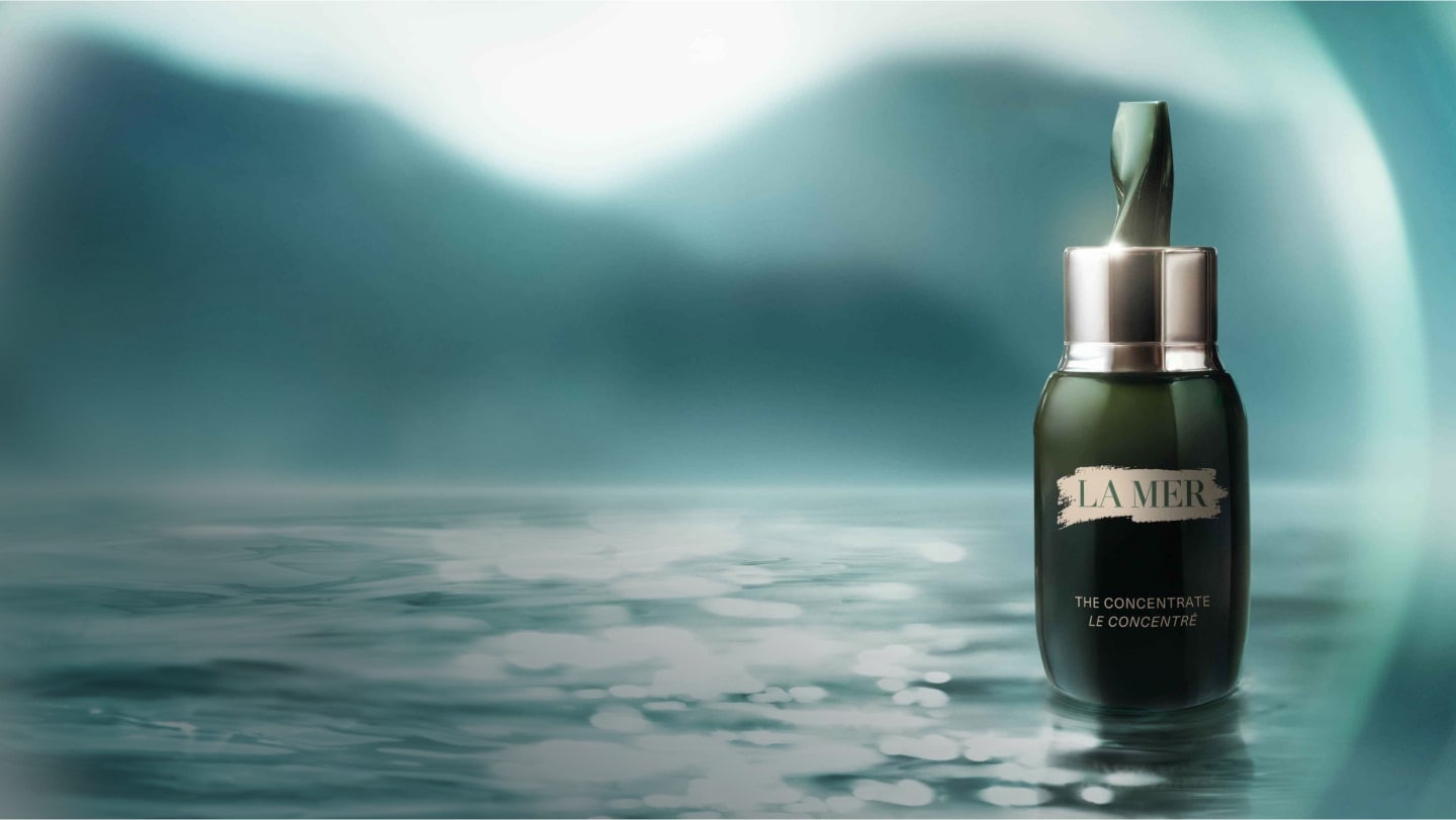 Image of a bottle of the concentrate in the shallow ocean.